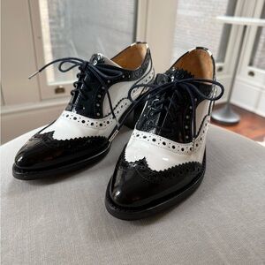 Classic Black and White Patent Wingtip Loafers